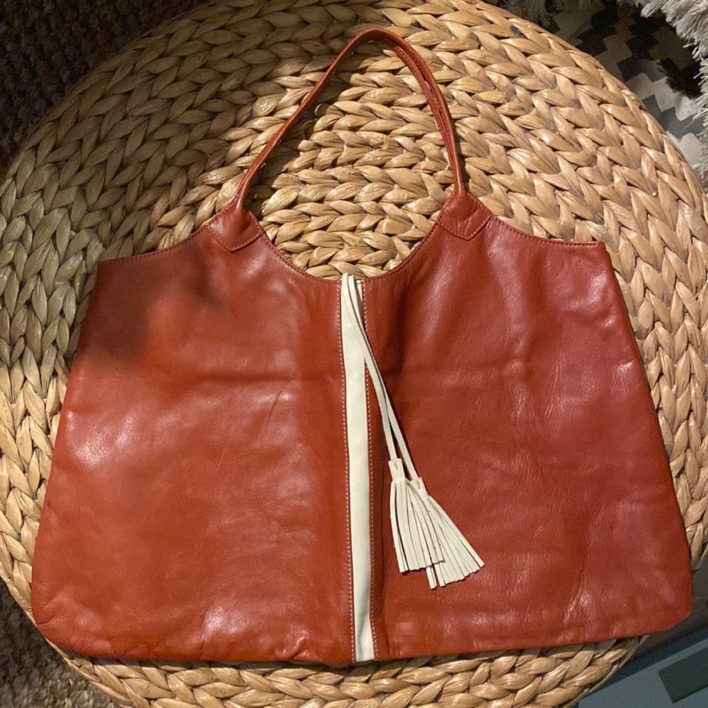Absolutely beautiful shoulder bag- never used and in perfect condition.